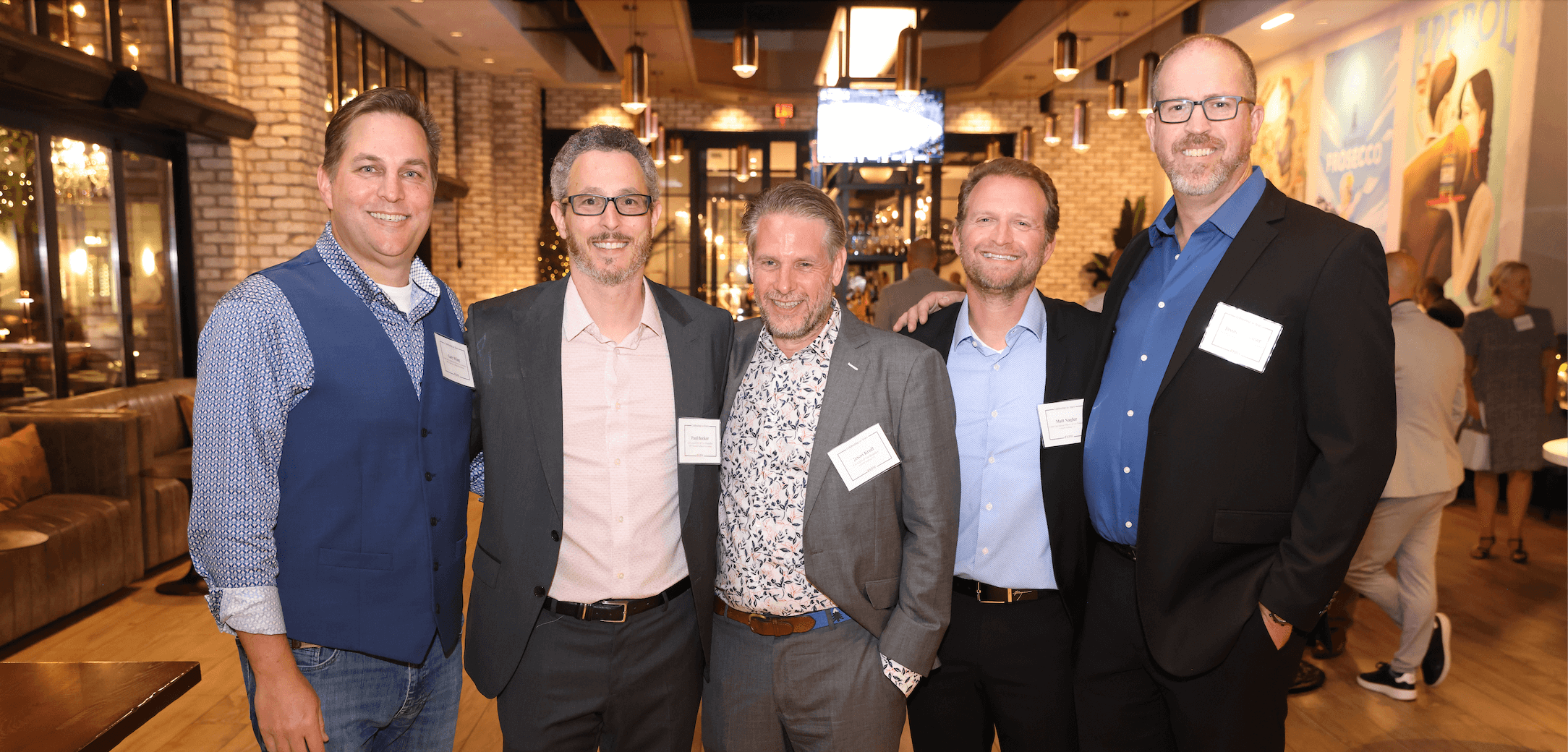 Business NH Magazine group of employees photographed smiling